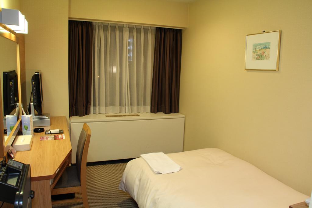 Hotel Sunroute New Sapporo Pokoj fotografie