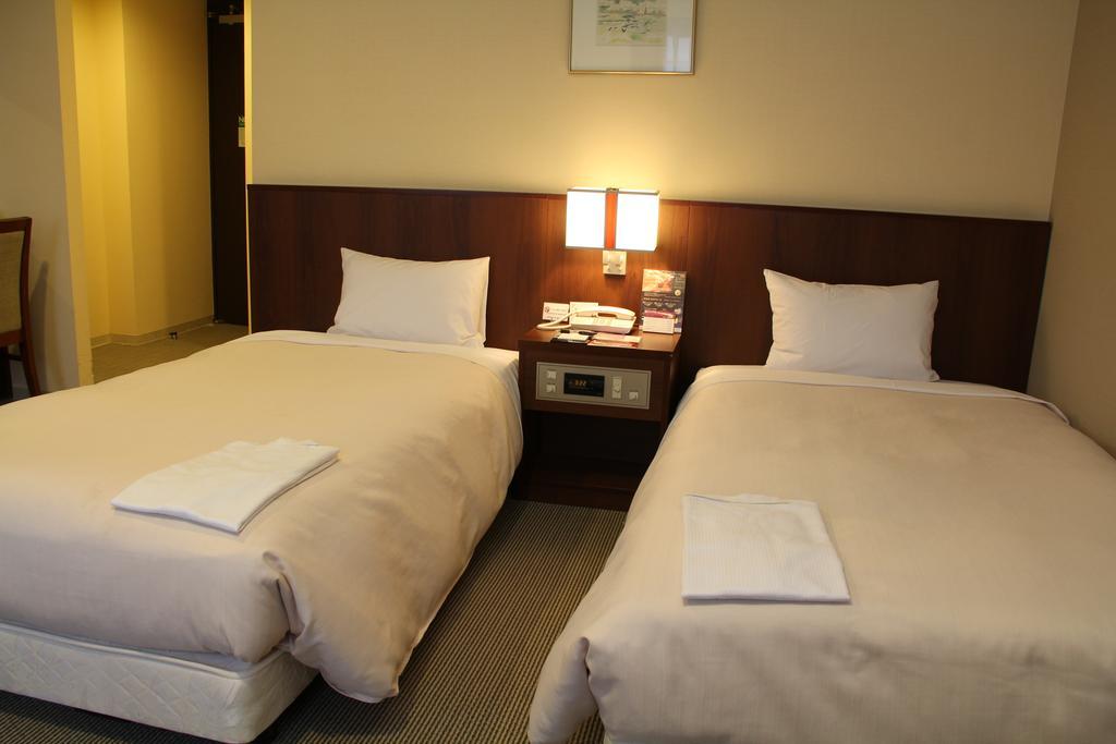 Hotel Sunroute New Sapporo Pokoj fotografie