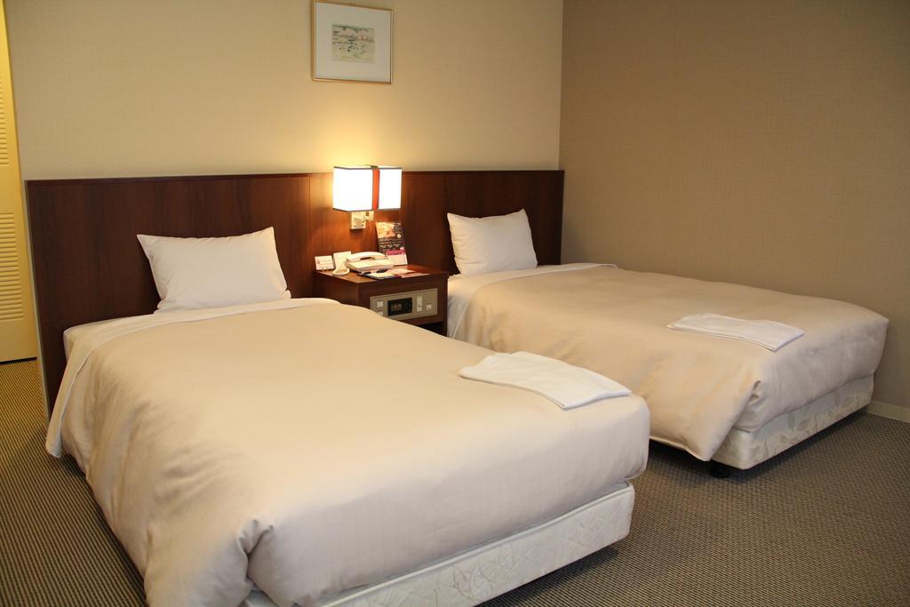 Hotel Sunroute New Sapporo Pokoj fotografie